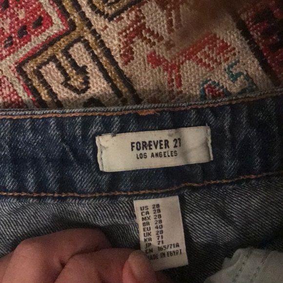 High waisted, medium wash denim shorts. - Picture 2 of 6